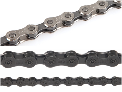 HG chain has bowed-out outer link plates (bottom). IG chain (top) has nicks out opposing corners of each outer plate to facilitate outward shifting.